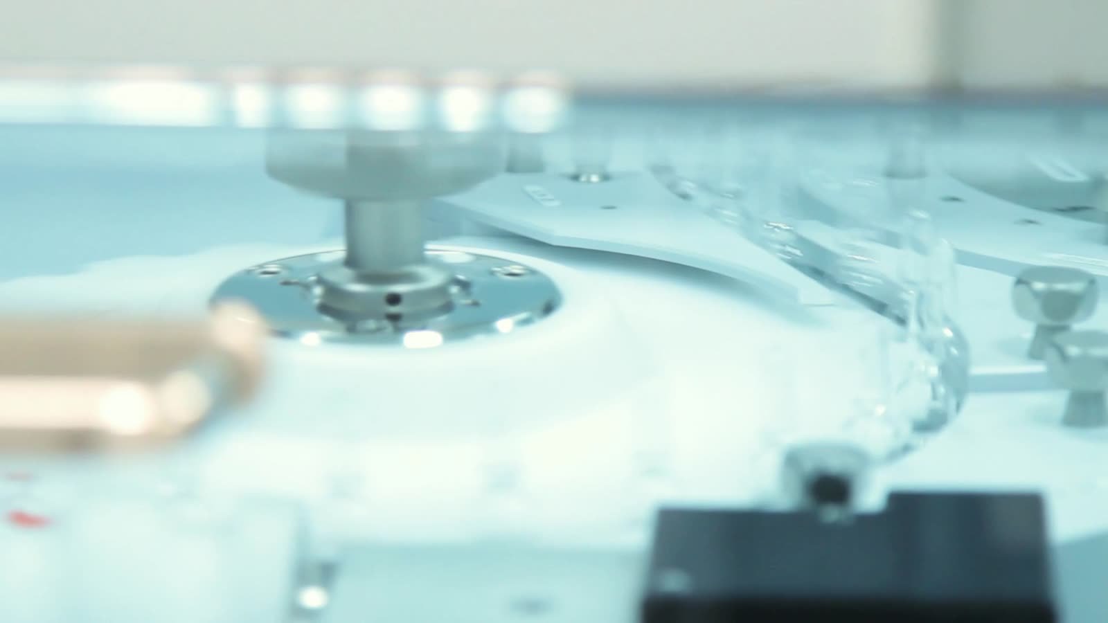 Glass ampoules moving along a pharmaceutical filling line
